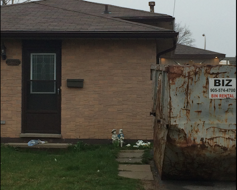 Ugly dumpster in driveway
